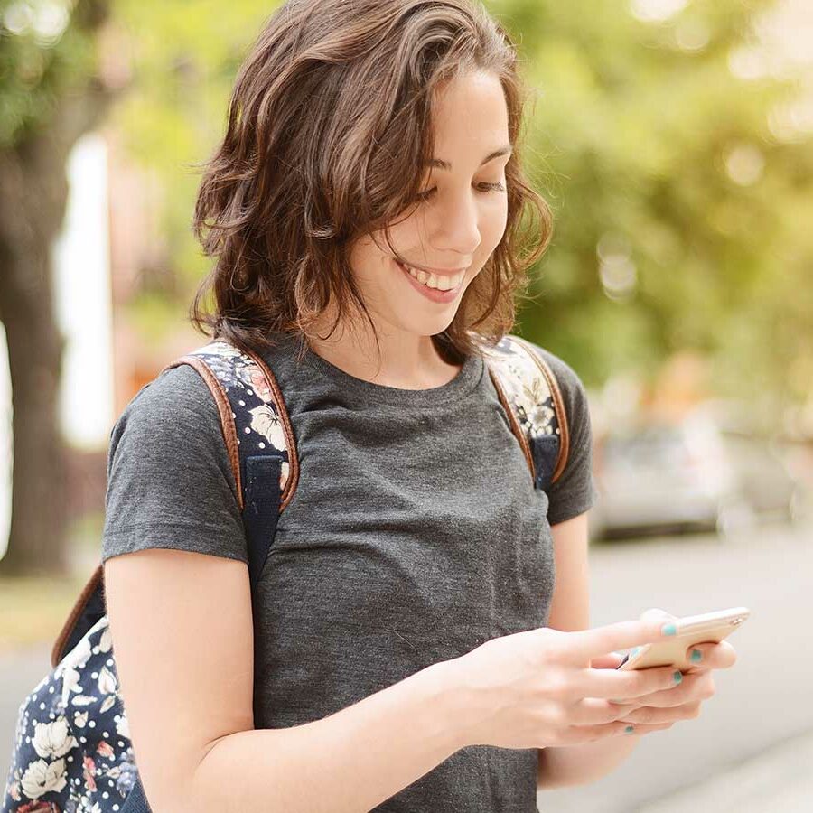 Credit Builder Loans Young Lady Looking At Phone Lake Central Bank